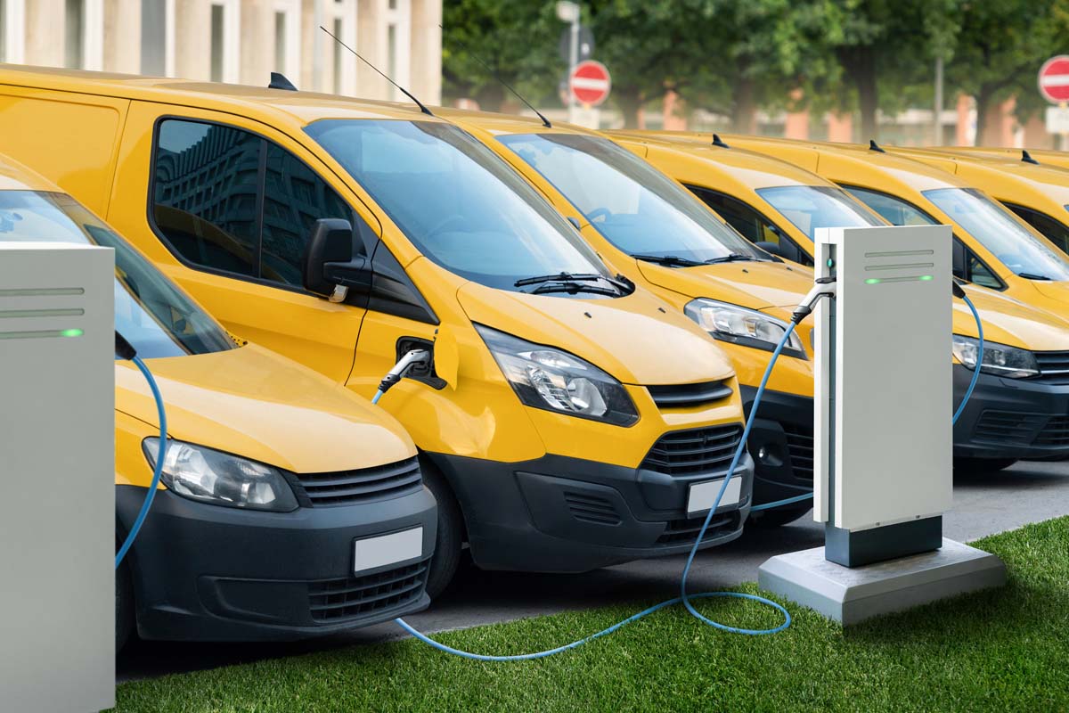 Fleet of electric vehicles in corporate parking lot