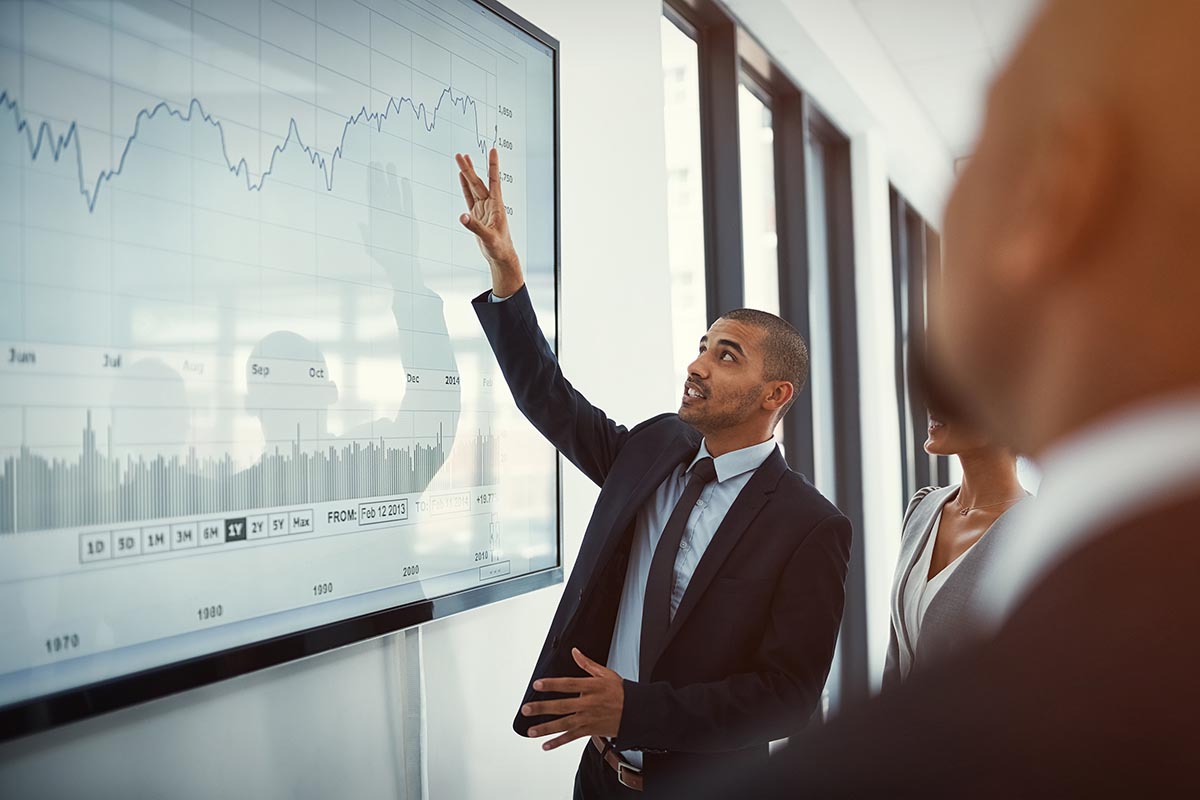 Employee showing financial impact of cyber risks