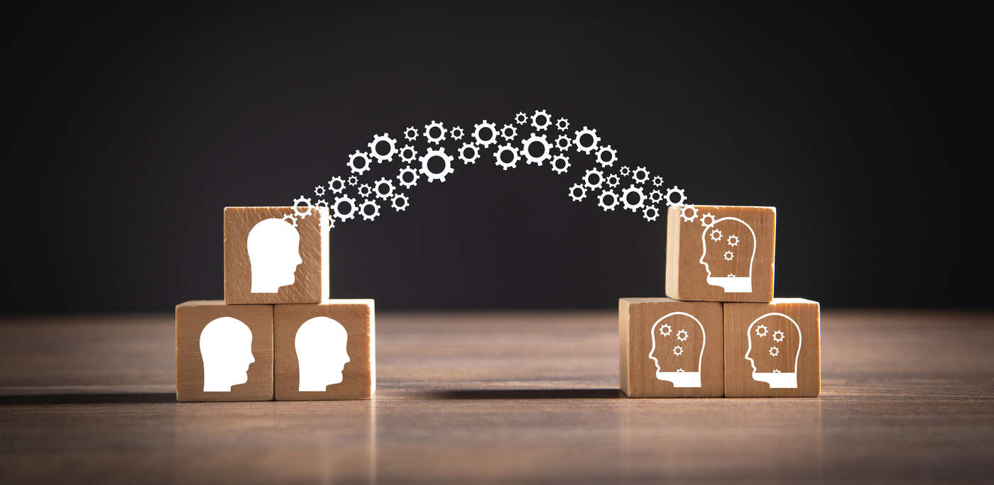 Knowledge being transferred from one group to another