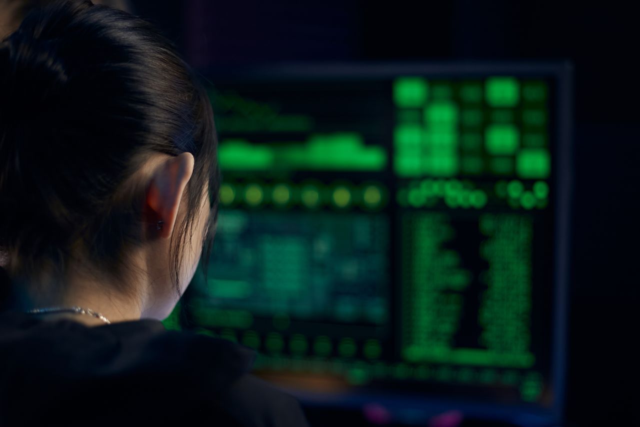 Executive reviewing unified multi-cloud compliance dashboard